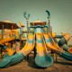 a playground with a slide and play structure | photo by fahim junaid
