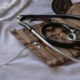 black stethoscope with brown leather case - photo by marcelo leal