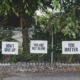 don't give up. you're not alone. you matter. signage on a metal fence -photo by dan meyers