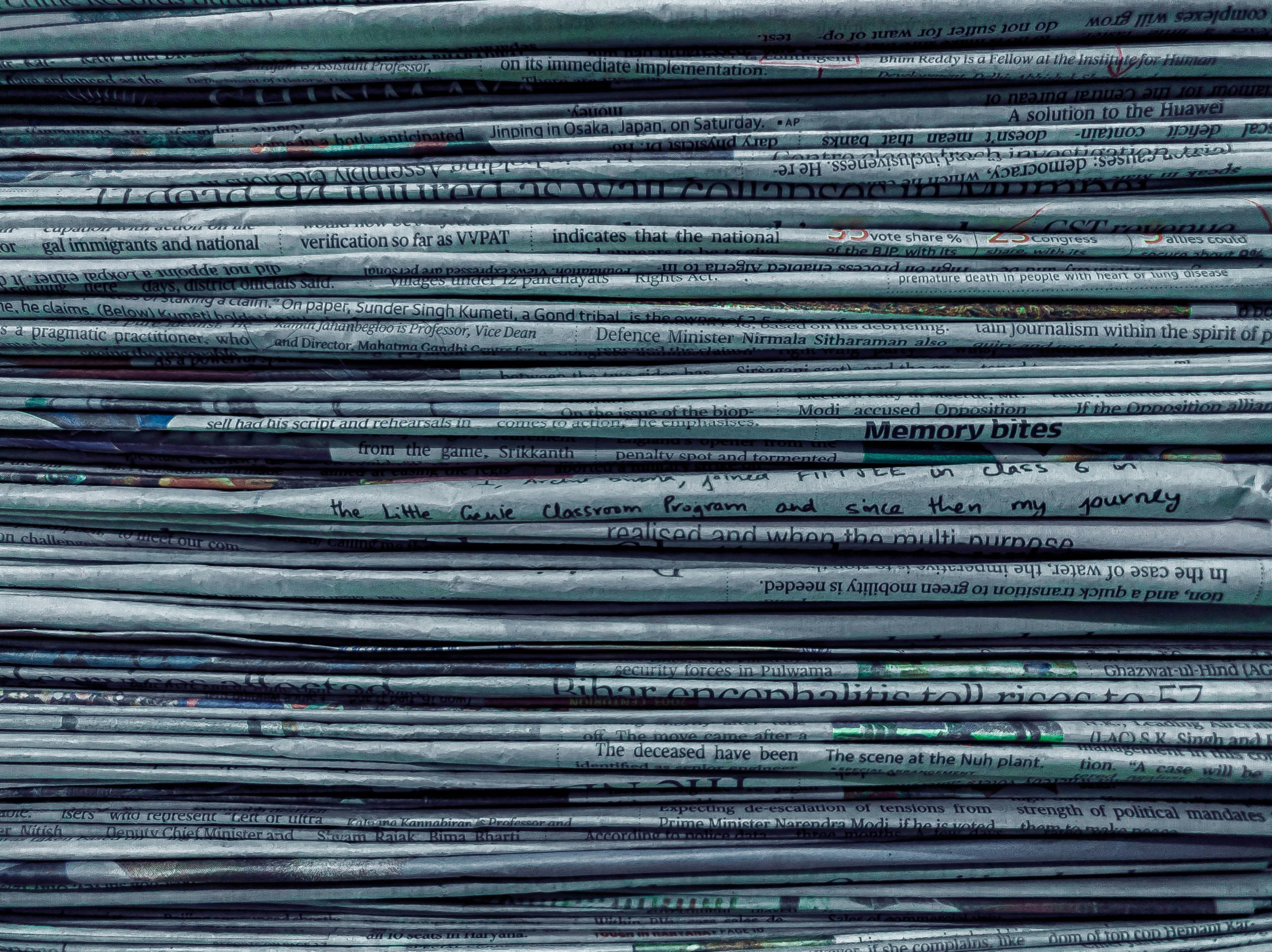 pile of newspapers | photo by utsav srestha