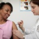 woman getting vaccinated - photo by cdc